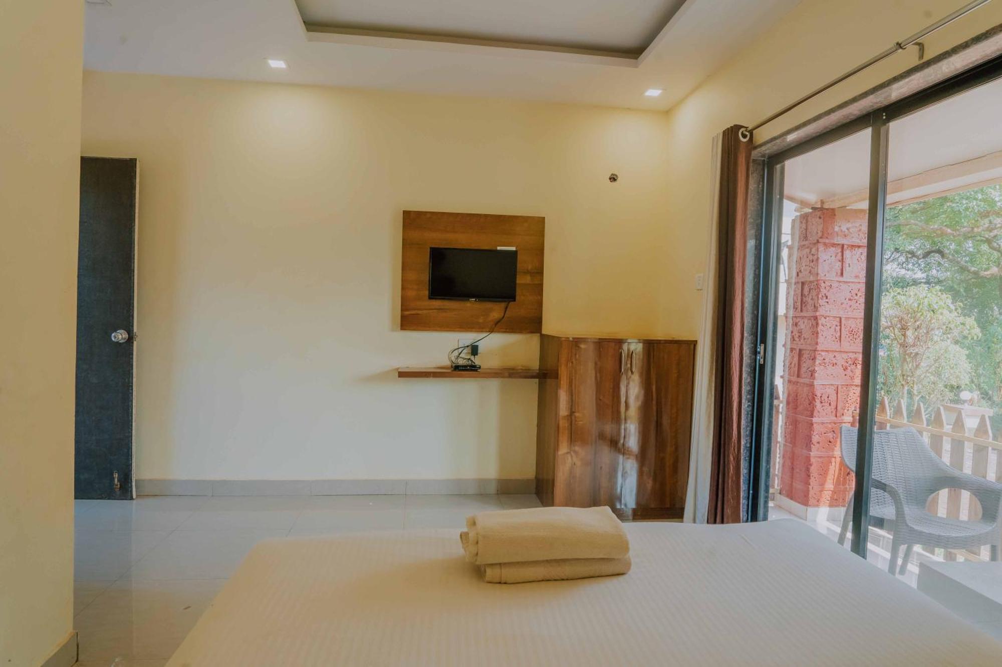 Hotel Oakwood Mahābaleshwar Habitación foto